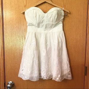 Bebe white fit and flare lined strapless dress M